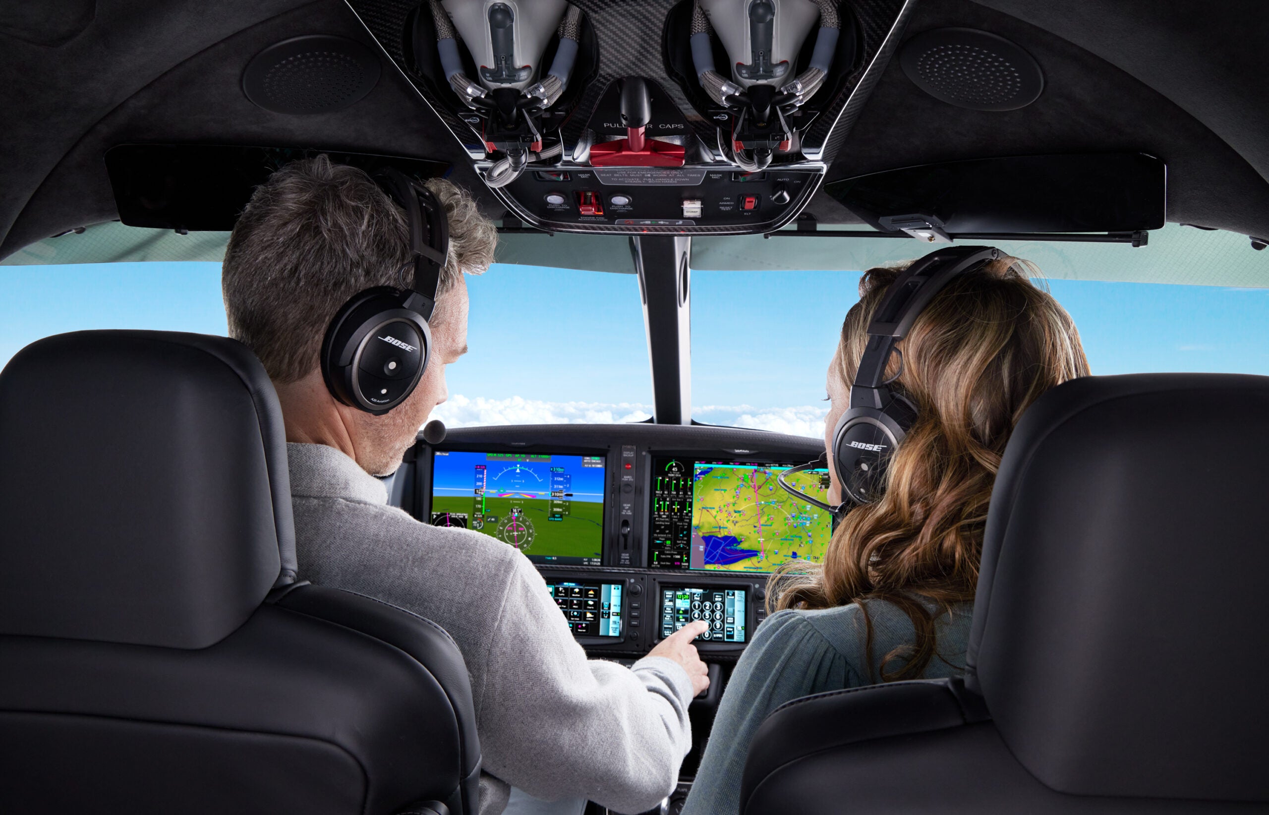 couple flying a vision jet