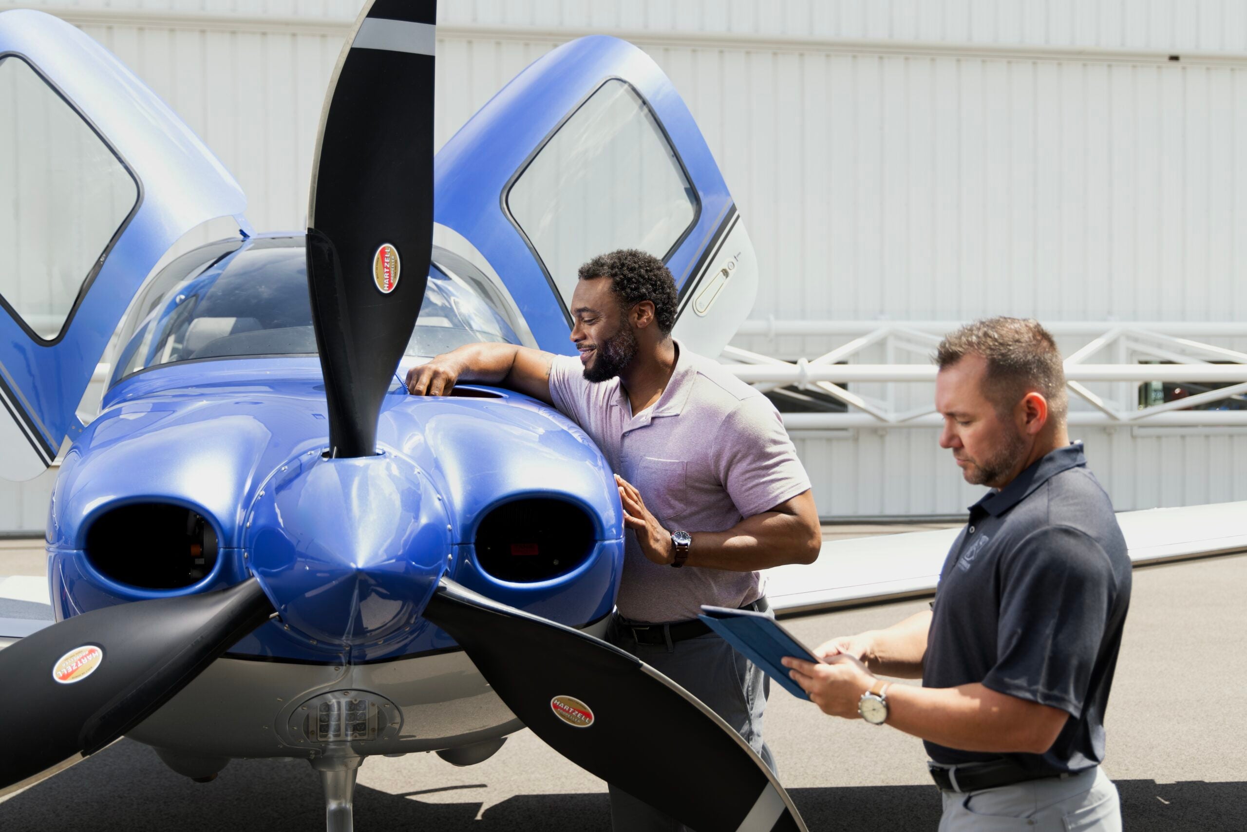 student checking the oil of SR series