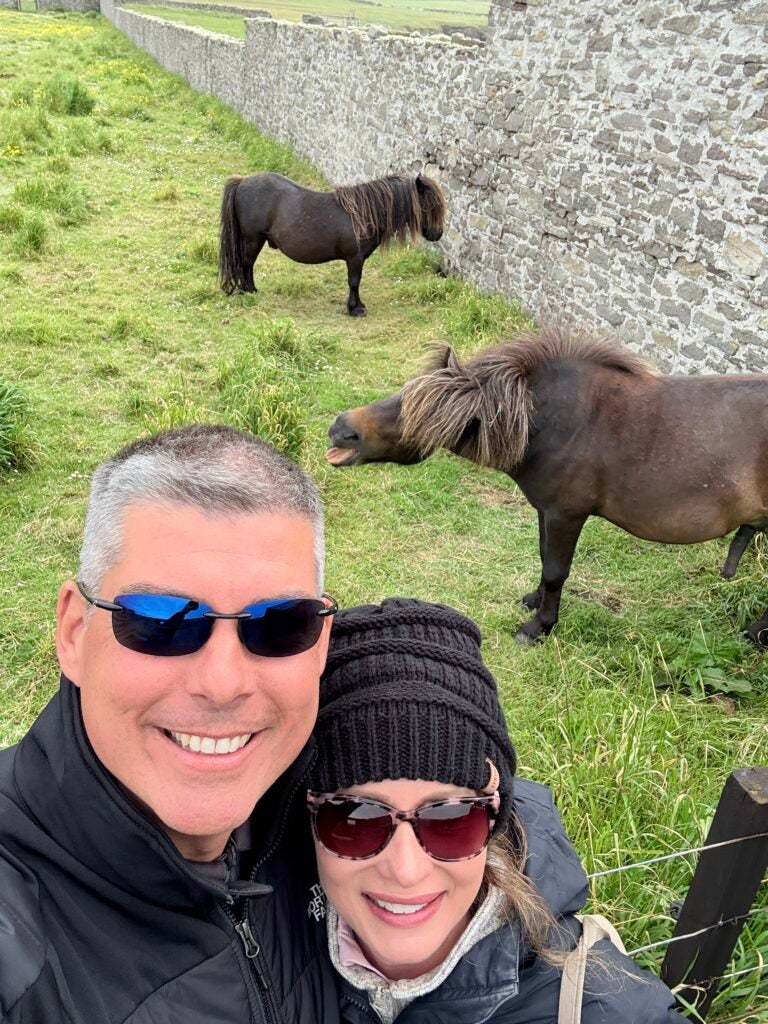 couple in front of iceland