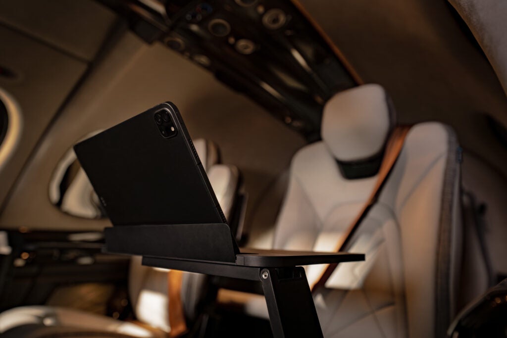 Vision Jet interior with built-in tray tables