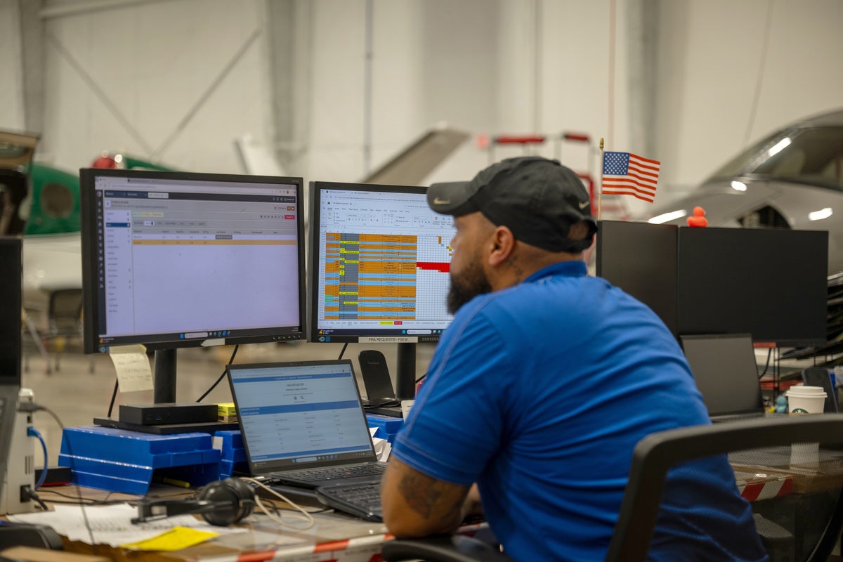 service tech working on computer