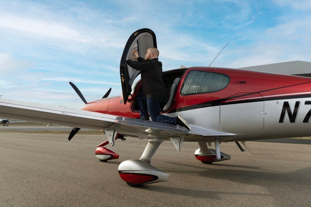 man on wing of sr series aircraft