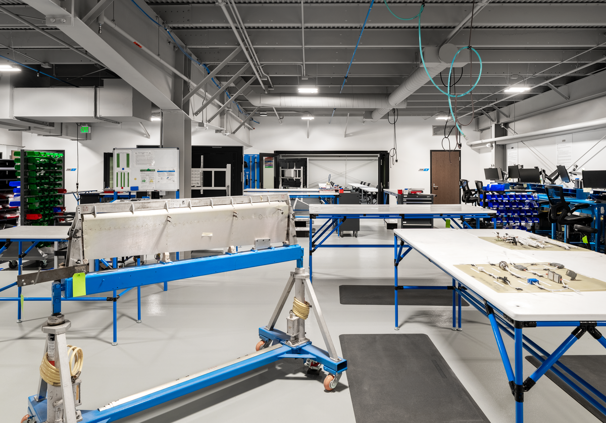 warehouse with working tables in the cirrus talent center