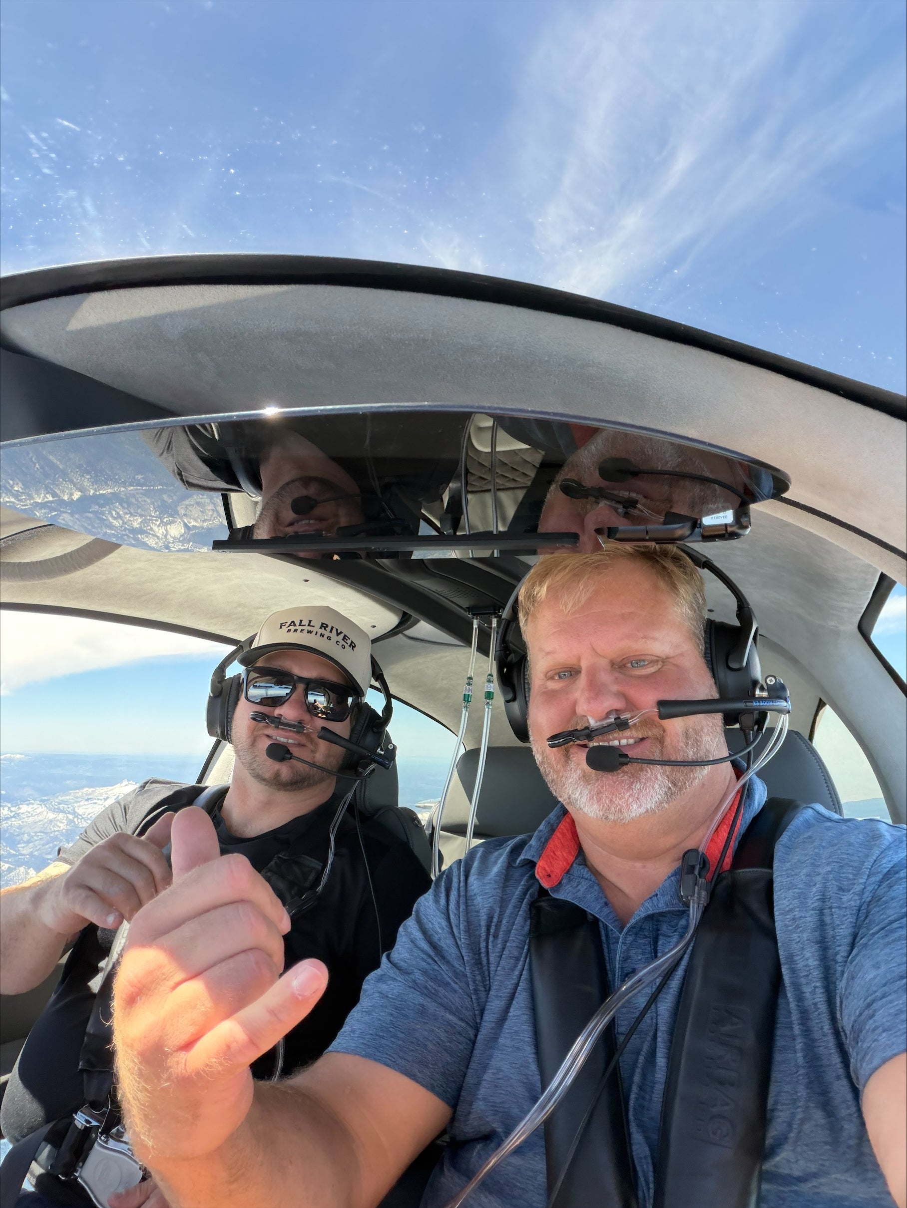 John Hutchings flying at altitude with a passenger in his SR.